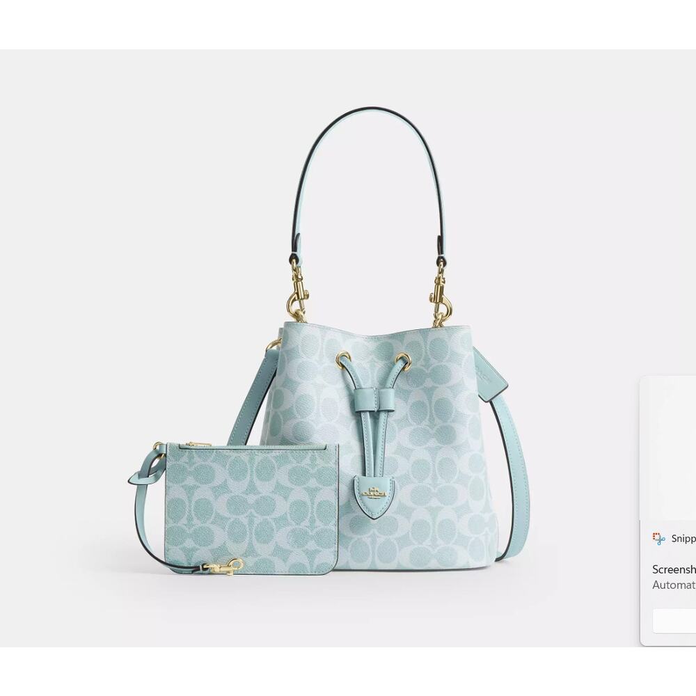 Rowan Bucket Bag In Signature Canvas CEZ36 Light Blue